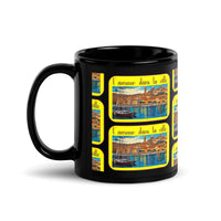 Glossy black mug designed by artist Raul Carrasco Garcia